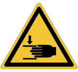 Warning sticker for hand entrapment, on a roll